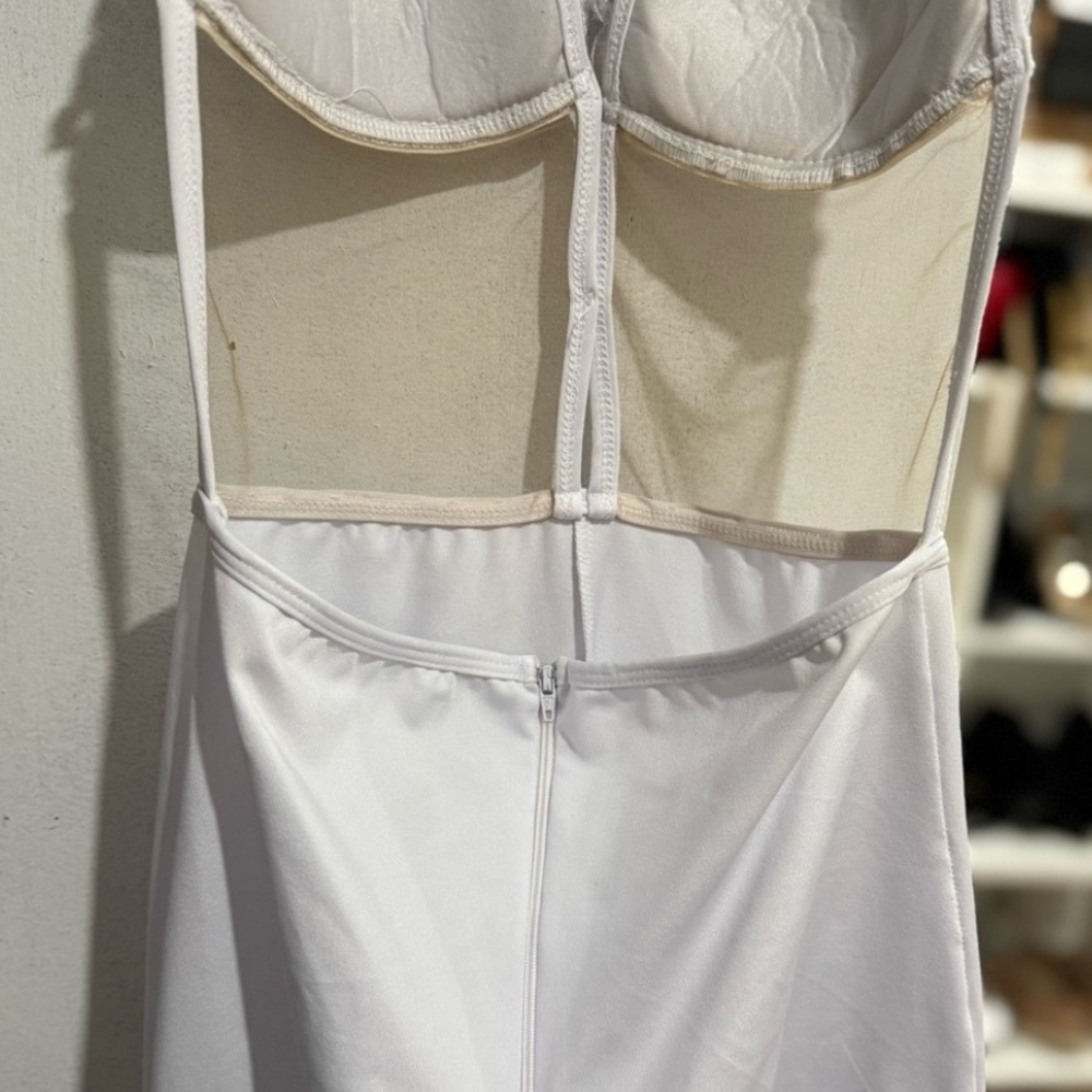 White Jumpsuit with form-fitting design and high-waisted silhouette